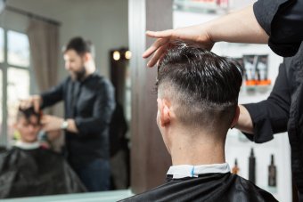 person-in-the-salon-getting-a-haircut-PL9YV7M.jpg